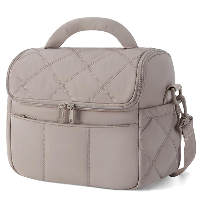 Elegant cosmetic bag with practical carrying handle Bowlift