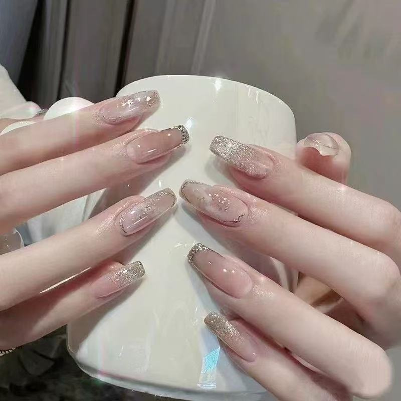 Glamorous artificial nails with rhinestone details Bowlift