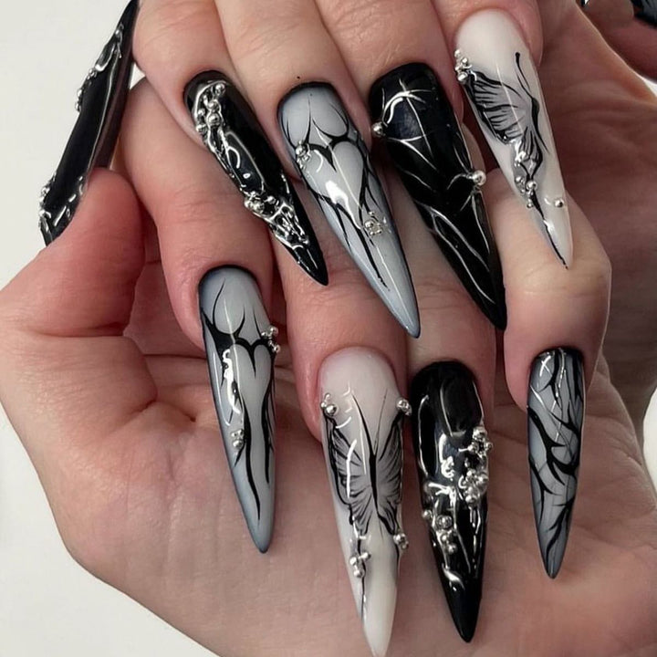 Artificial nail set with elegant geometric designs and creative metallic accents Bowlift