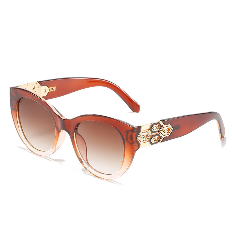 Fashion-Forward Cat-Eye Sunglasses with Decorative Accents Bowlift