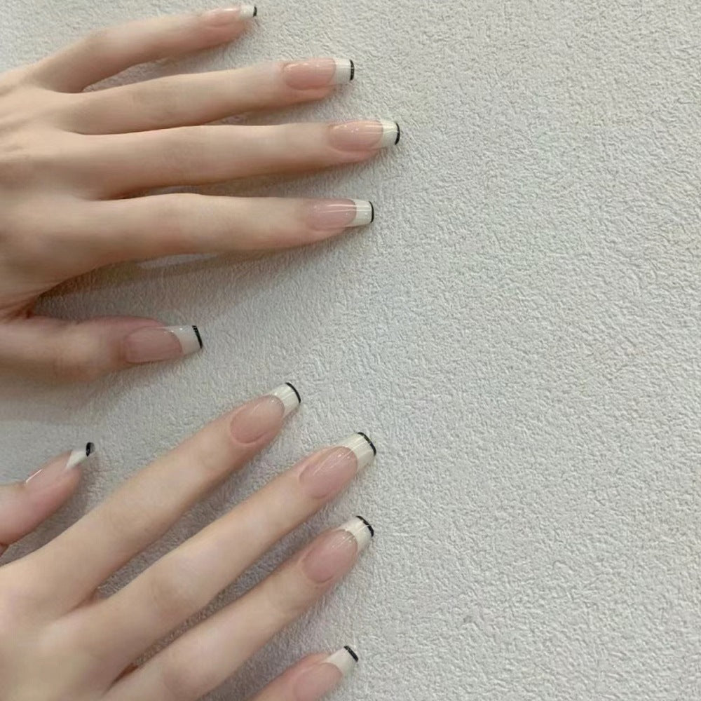 French Tip Press-On Nails with Elegant Black Detailing Bowlift