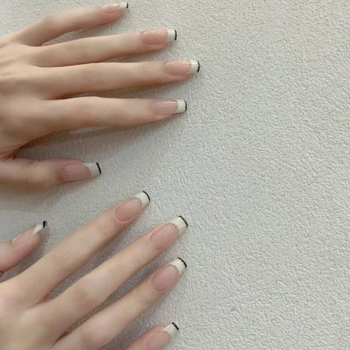 French Tip Press-On Nails with Elegant Black Detailing Bowlift