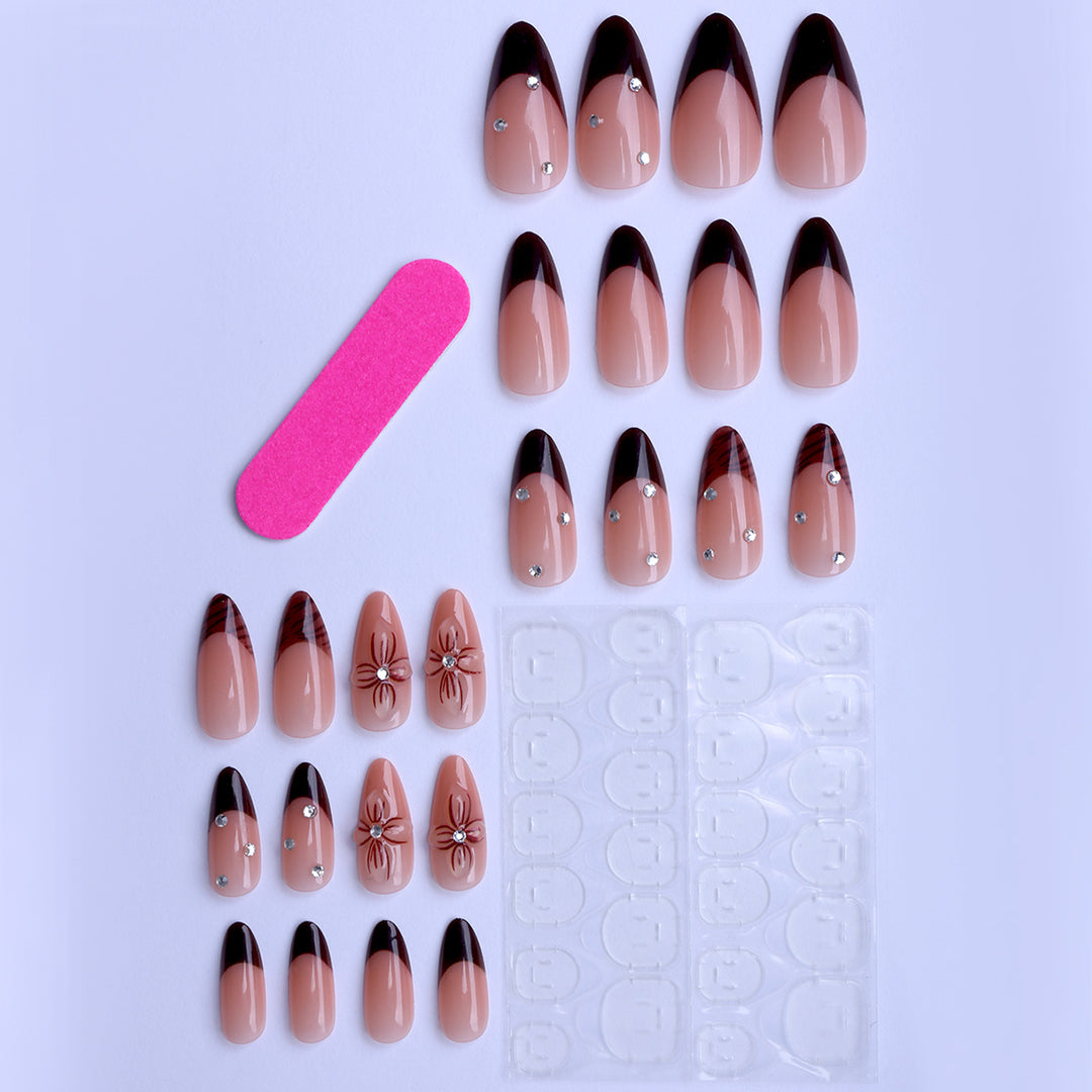 Artificial nails with elegant flower design and glitter accents Bowlift