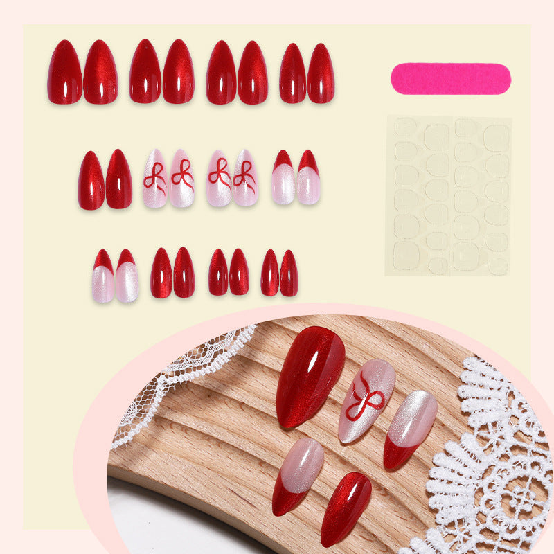 Glossy Press-On Nail Set with Elegant Ribbon Designs Bowlift