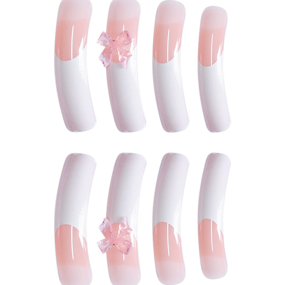 Elegant Nail Art Enhancements with Decorative Bow Accents Bowlift