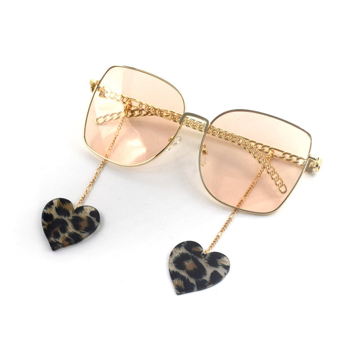 Heart-Shaped Dangle Earrings with Golden Chain Bowlift