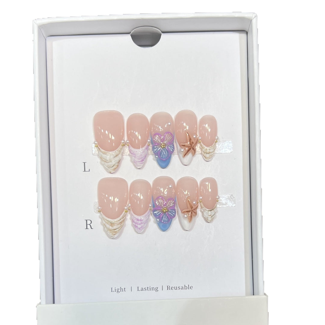 Artistic Press-On Nail Art Set with Floral and Starfish Design Bowlift