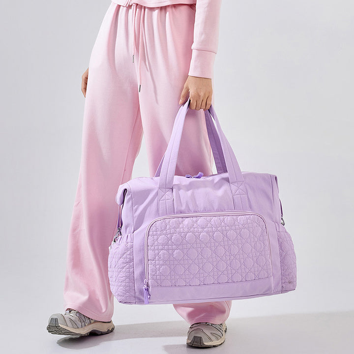 Sporty travel bag with innovative compartment design Bowlift