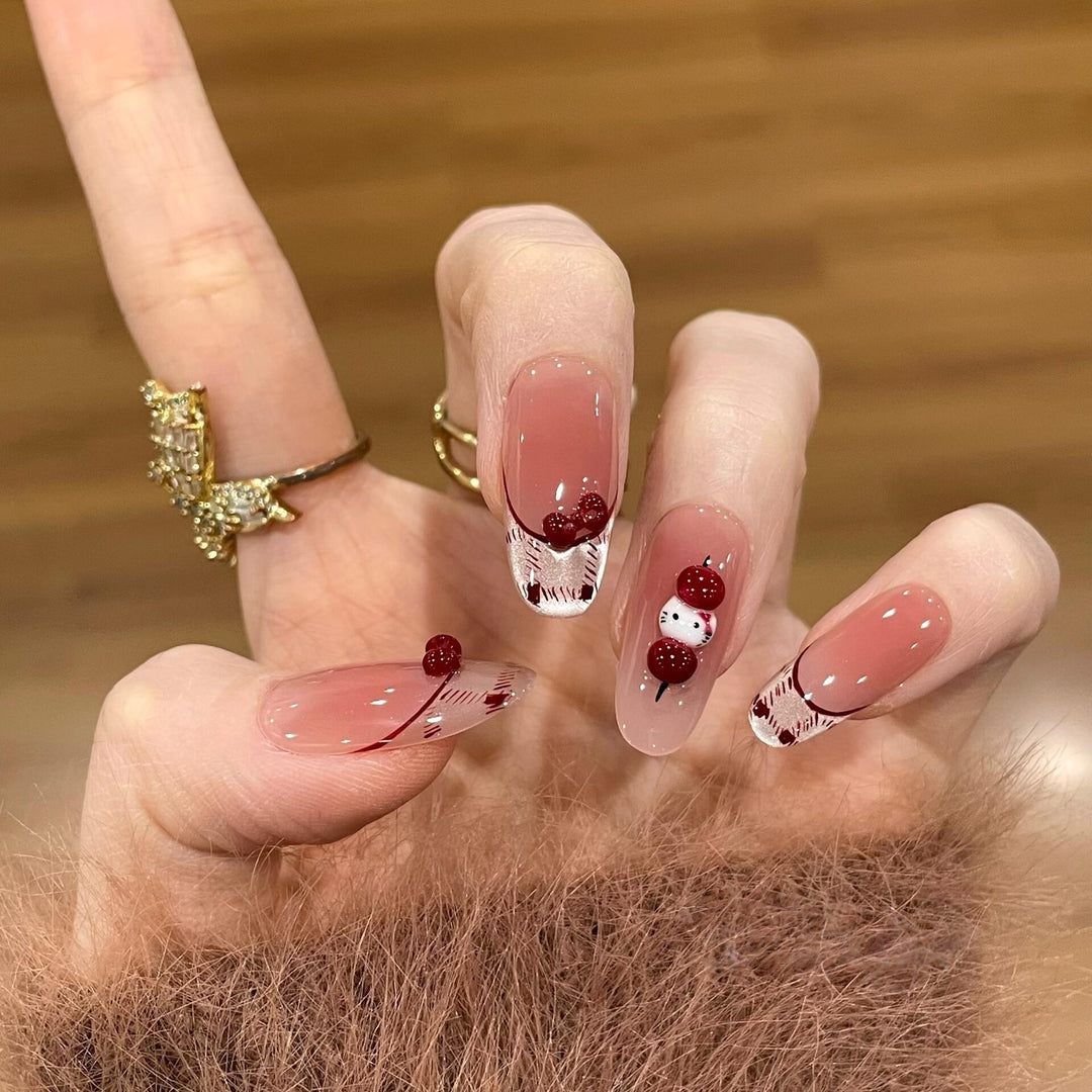 Artificial nails with playful Hello Kitty design Bowlift