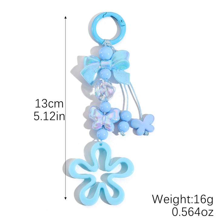 Playful keychain with flower and butterfly details Bowlift