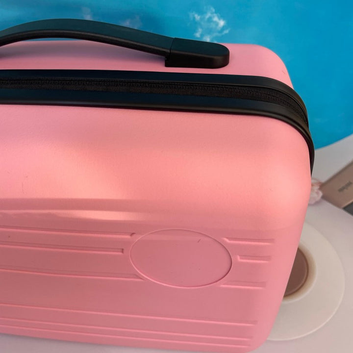 compact hardshell travel carry case with top handle and reinforced ridged shell Bowlift
