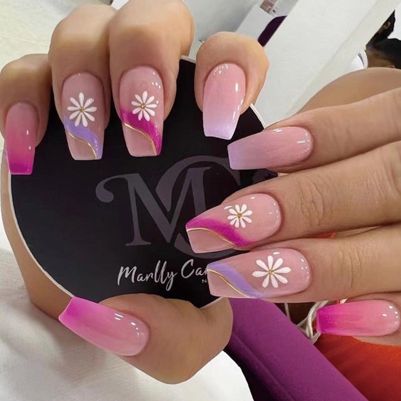Artful nail extensions with colorful ombre design and floral accents Bowlift