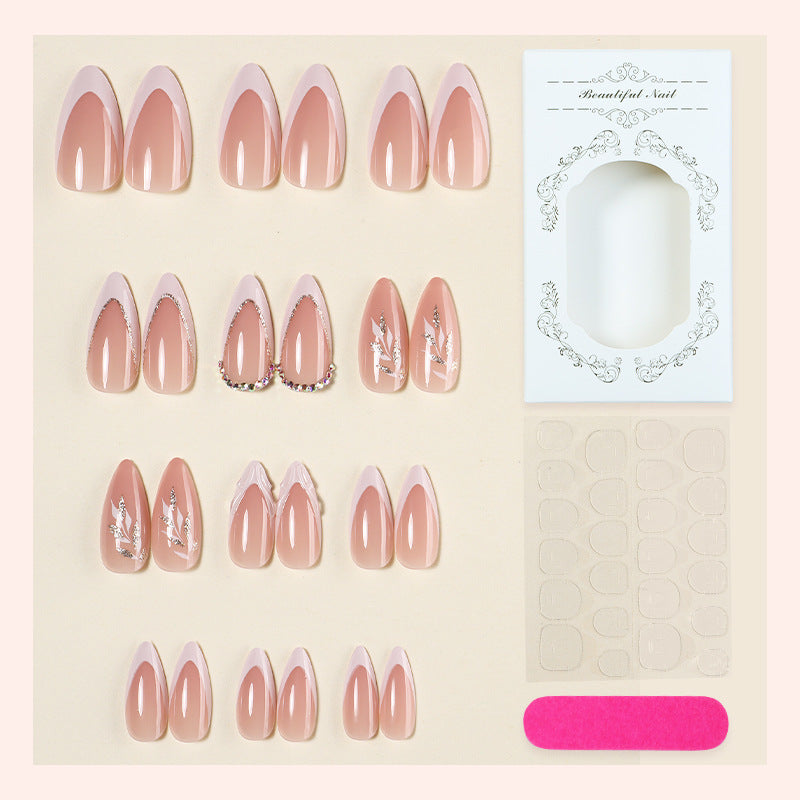 Artificial nail set with elegant tips and glitter accents Bowlift