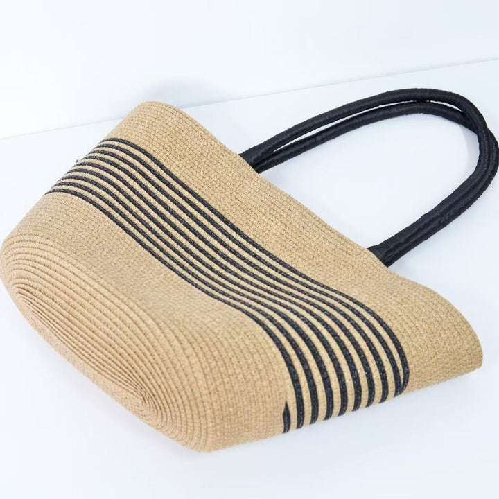 Beach bag with elegant stripe pattern and sturdy shoulder straps Bowlift