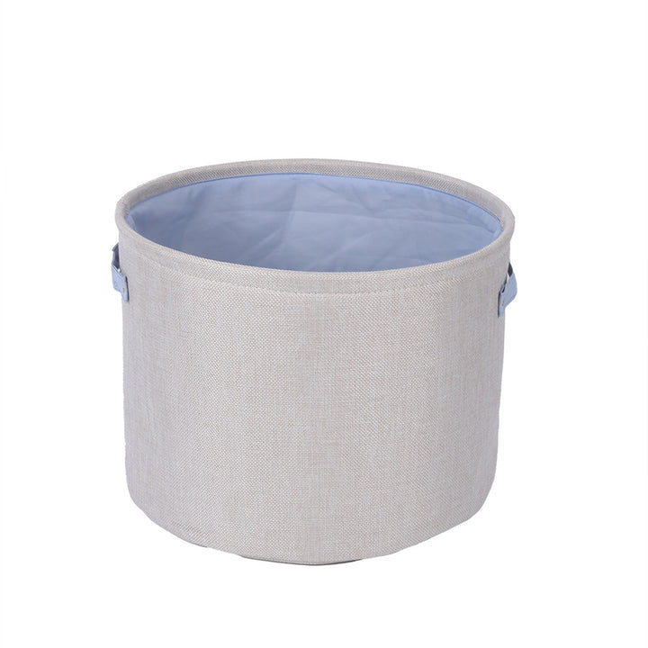 Organizer basket with practical handle and water-repellent inner coating