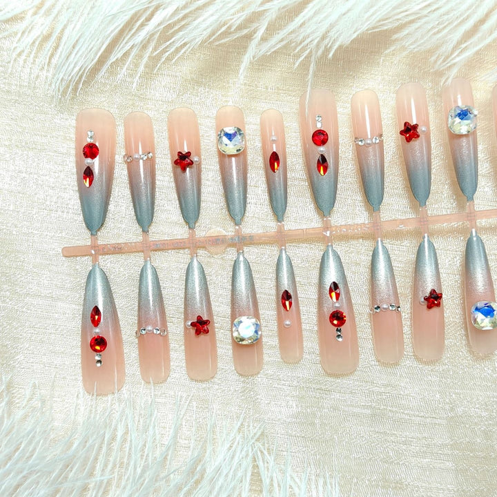 Artificial nails with glamorous glitter design and 3D applications Bowlift