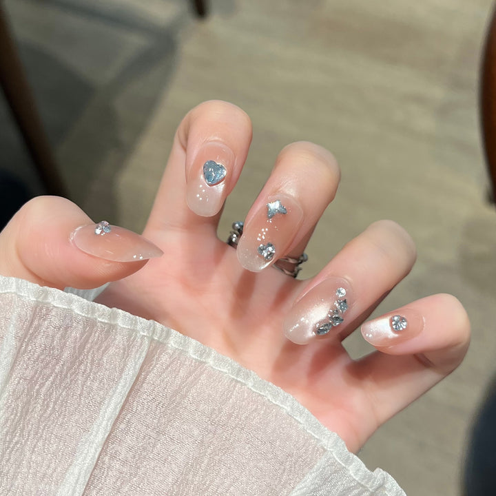 Elegant Nail Art Extensions with Pearl Accents Bowlift