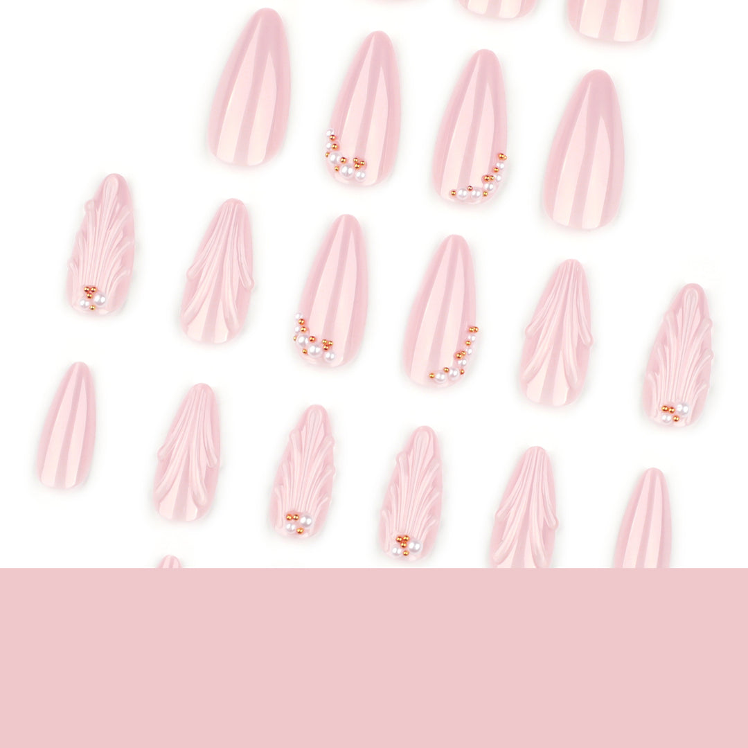 Elegant stiletto nails with shimmer design and pearl decorations Bowlift