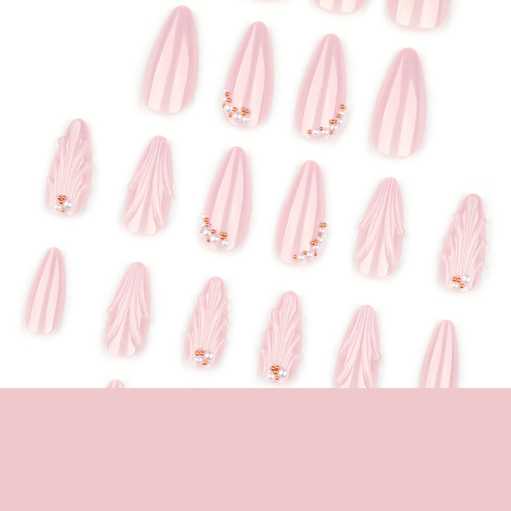 Elegant stiletto nails with shimmer design and pearl decorations Bowlift