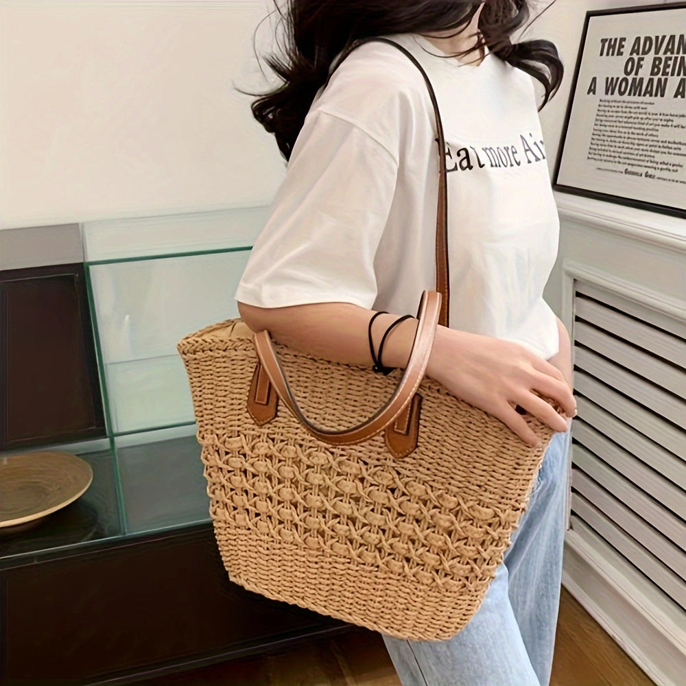 Handbag made of woven natural material with elegant leather handles Bowlift