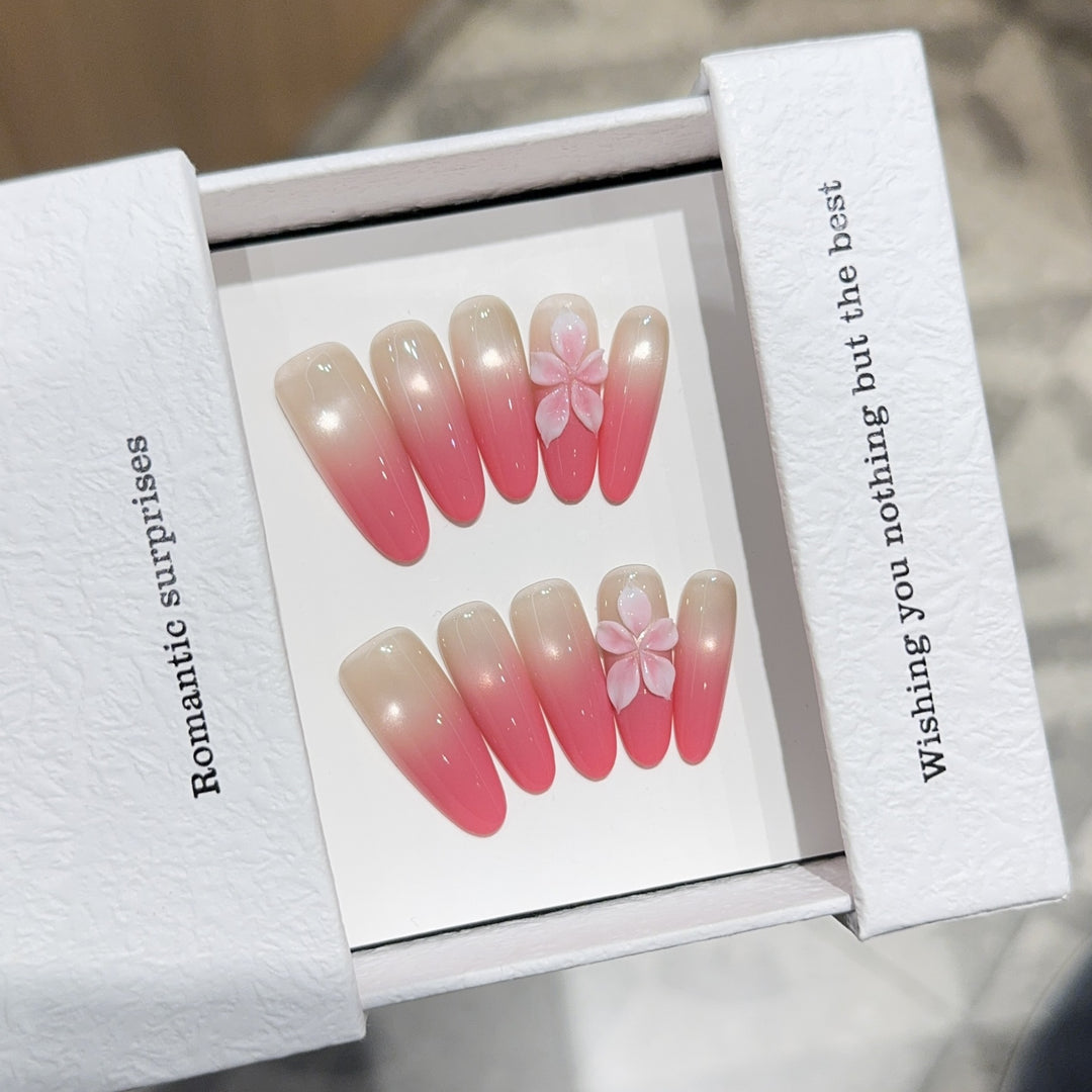 Artificial nails with romantic ombre design and floral accents Bowlift
