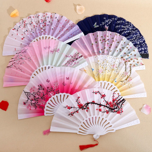 Ladies' artistically designed hand fan Bowlift