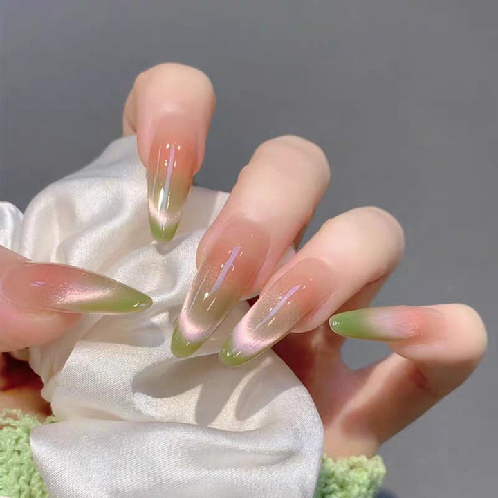 Artistic Press-On Nail Design with Decorative Silver Accents Bowlift
