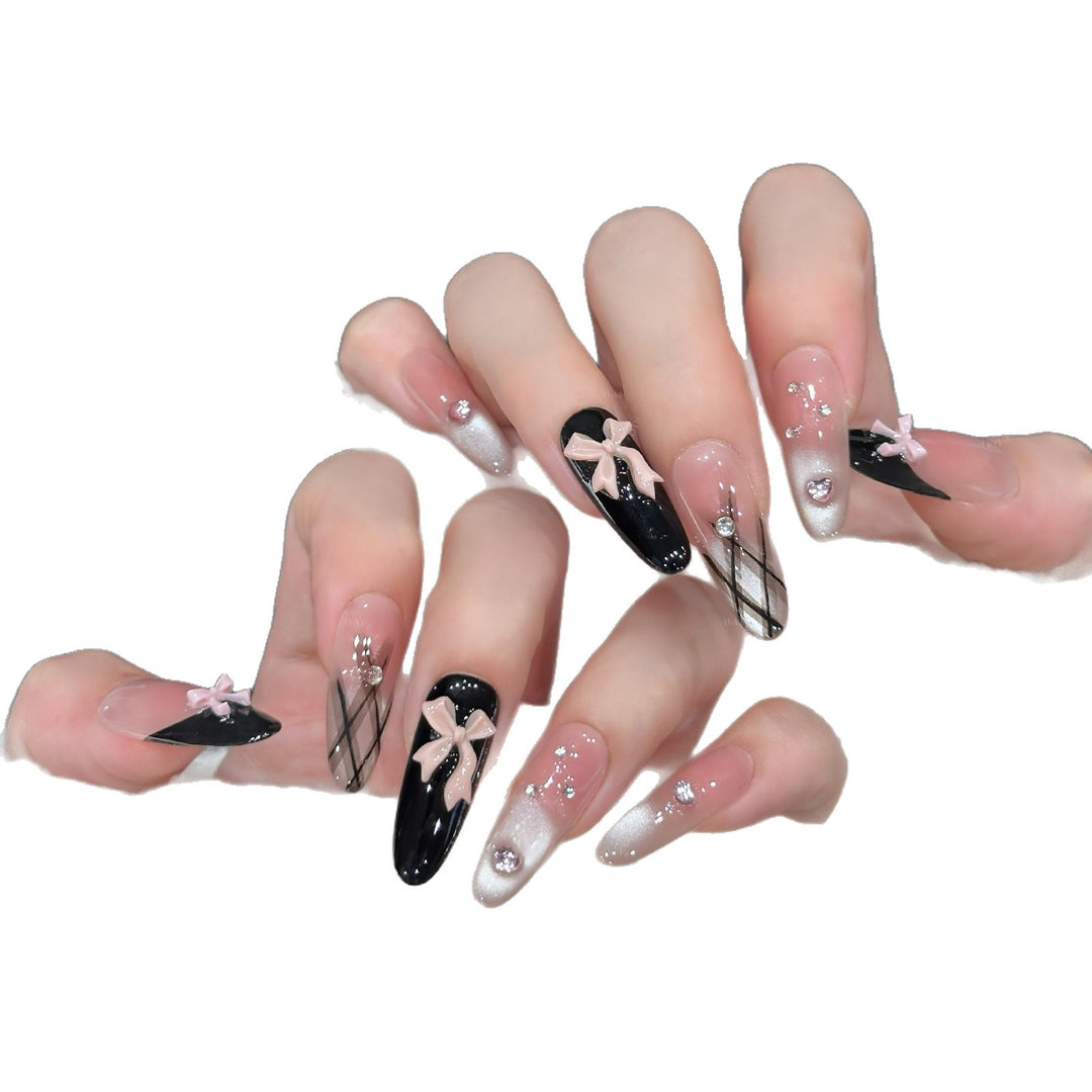 Artificial nail tips with elegant bows and glitter details Bowlift
