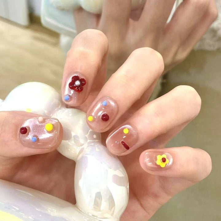 Artificial nails with playful decor Bowlift