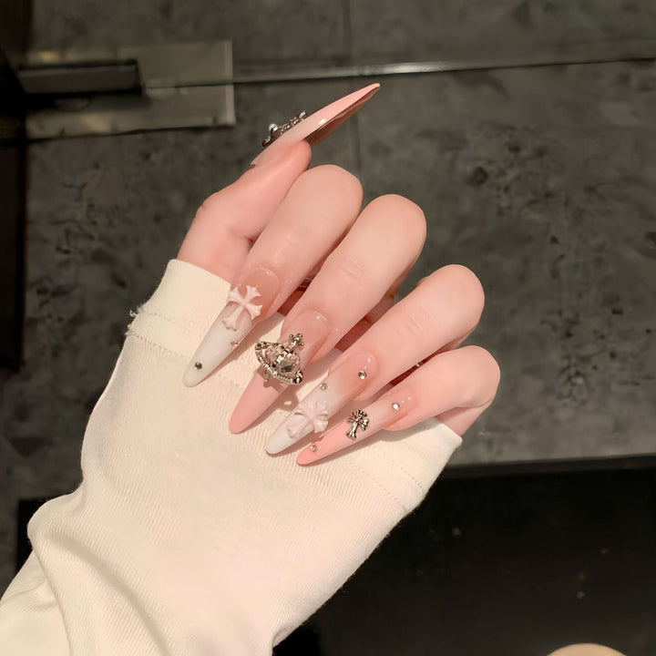 Acrylic nails with rhinestone embellished accents Bowlift