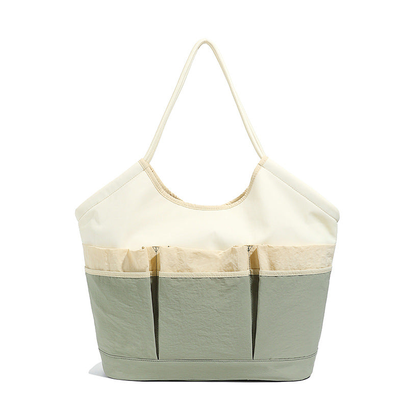 Generous Tote Bag With Multiple Outside Pockets Bowlift