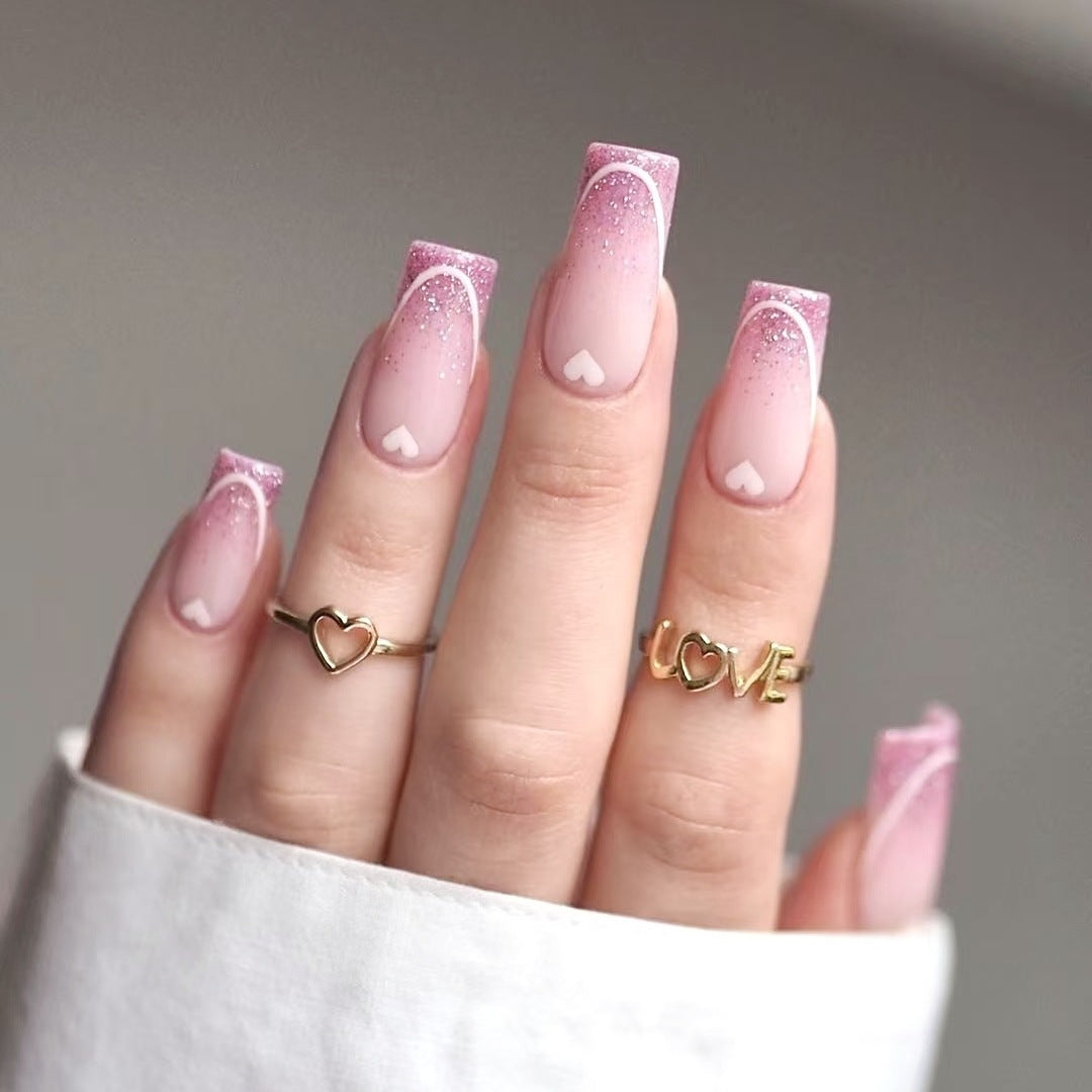 Nail art set with romantic heart designs and glamorous accents Bowlift