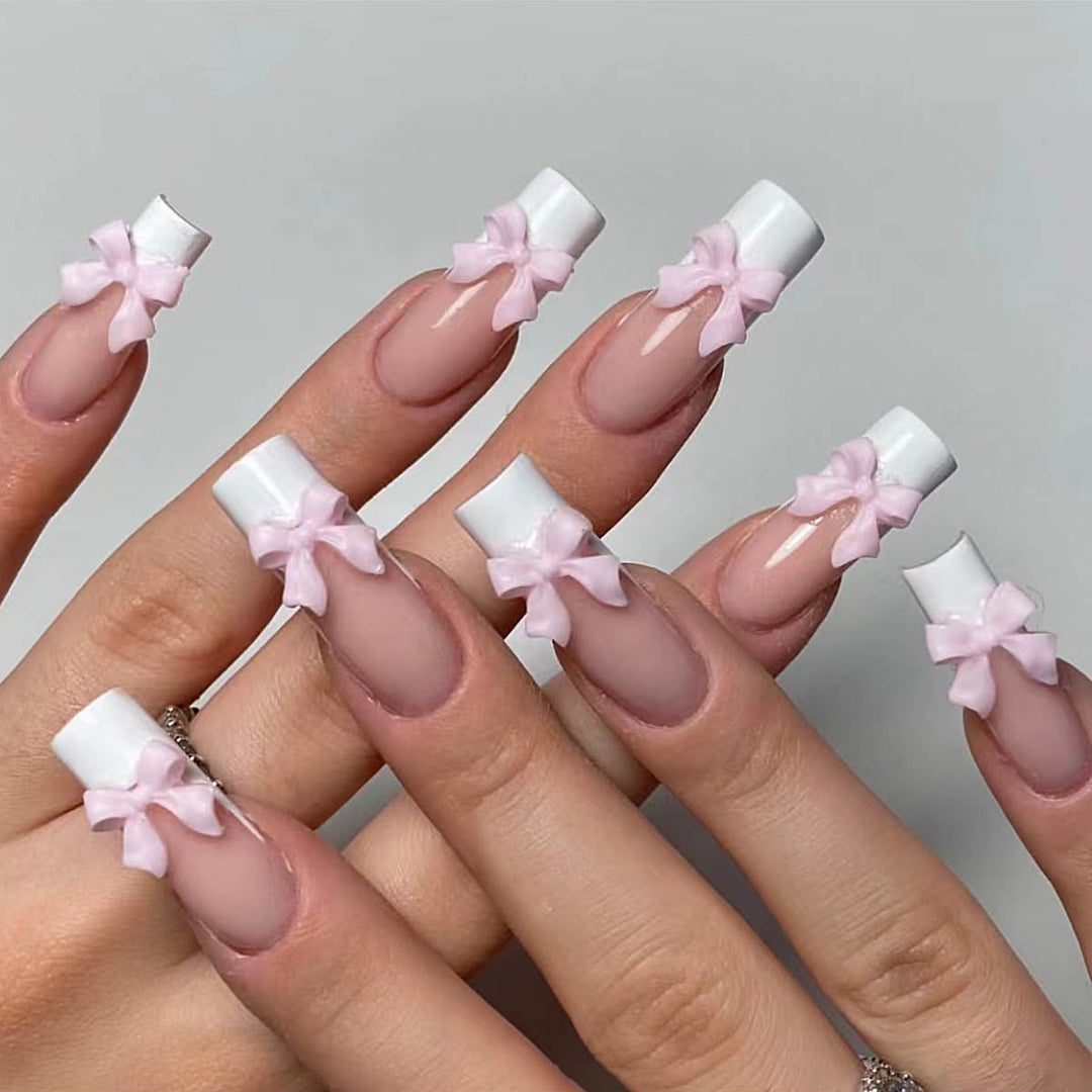 Artificial nails with playful bow design Bowlift
