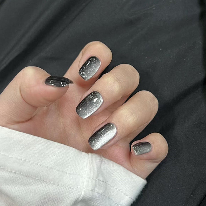 Artifical nail set with glamorous ombre effect and glitter embellishments Bowlift