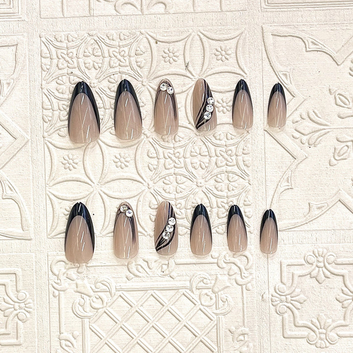Elegant Press-On Nail Design with Rhinestone Accents Bowlift