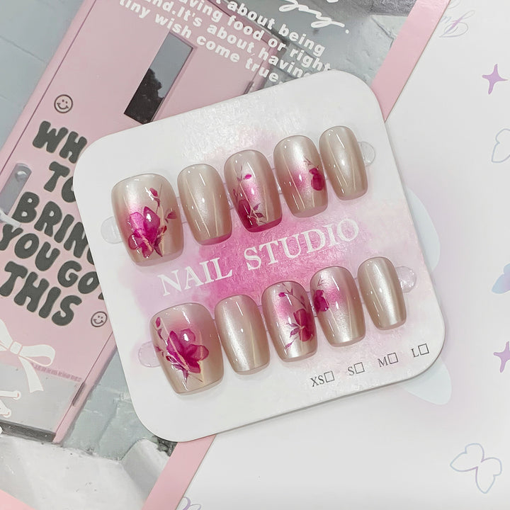 Artificial nail tips with floral accents Bowlift