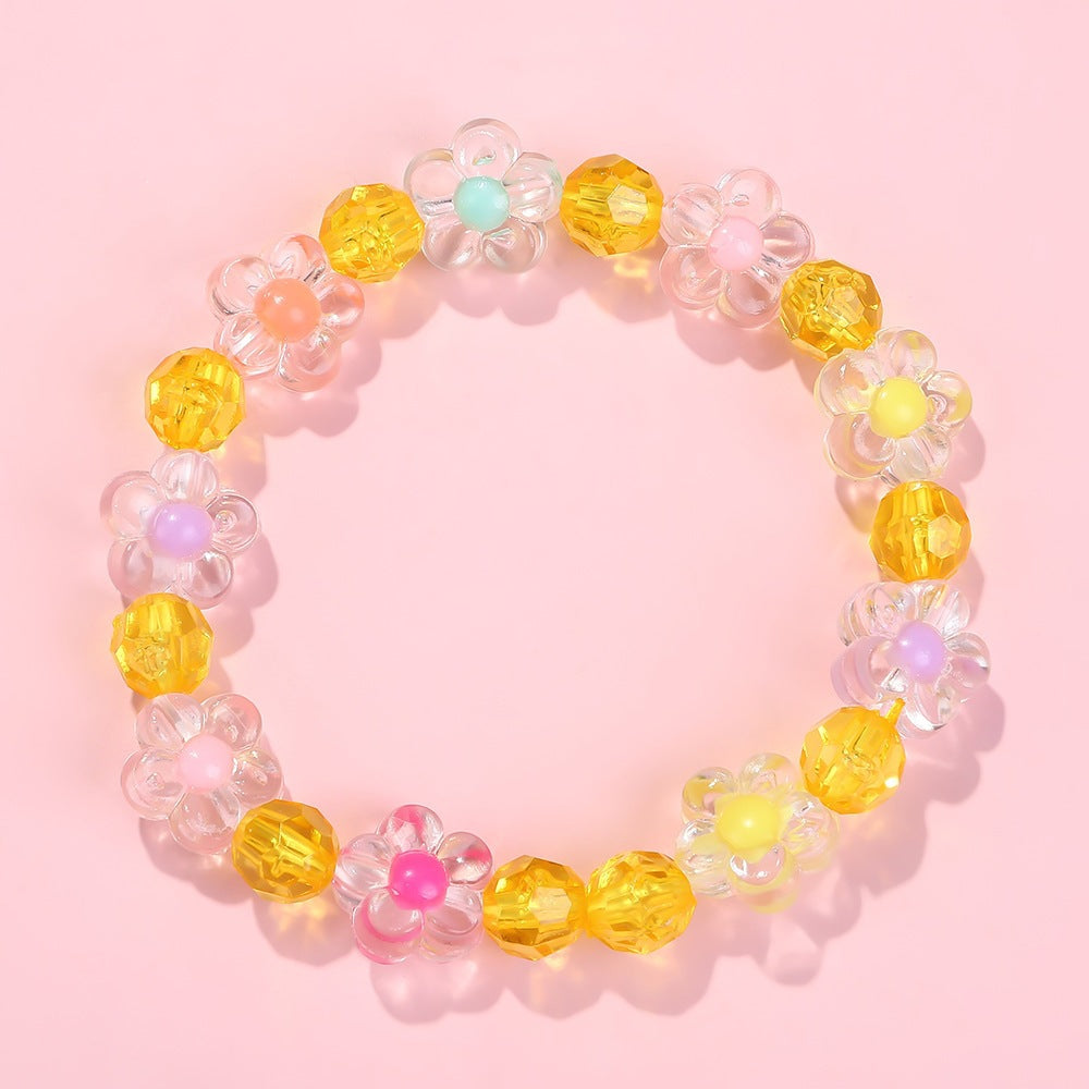 Friendship bracelet with colorful flower motifs Bowlift