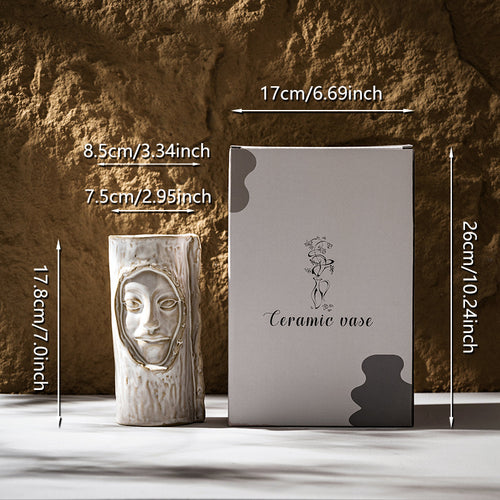 Handmade ceramic sculptural face-stem cylindrical flower pot with textured glaze
