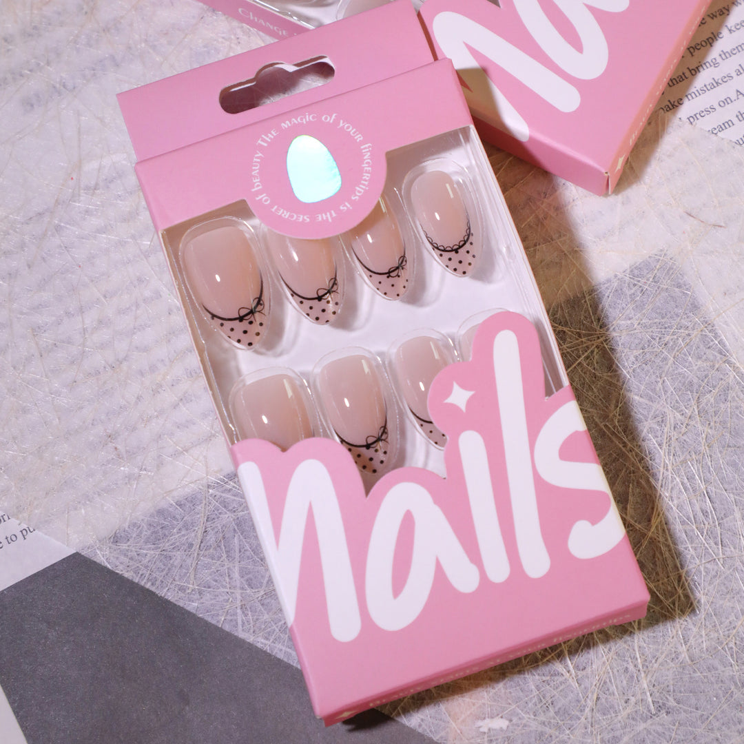 Elegant artificial nails with glitter and French design Bowlift