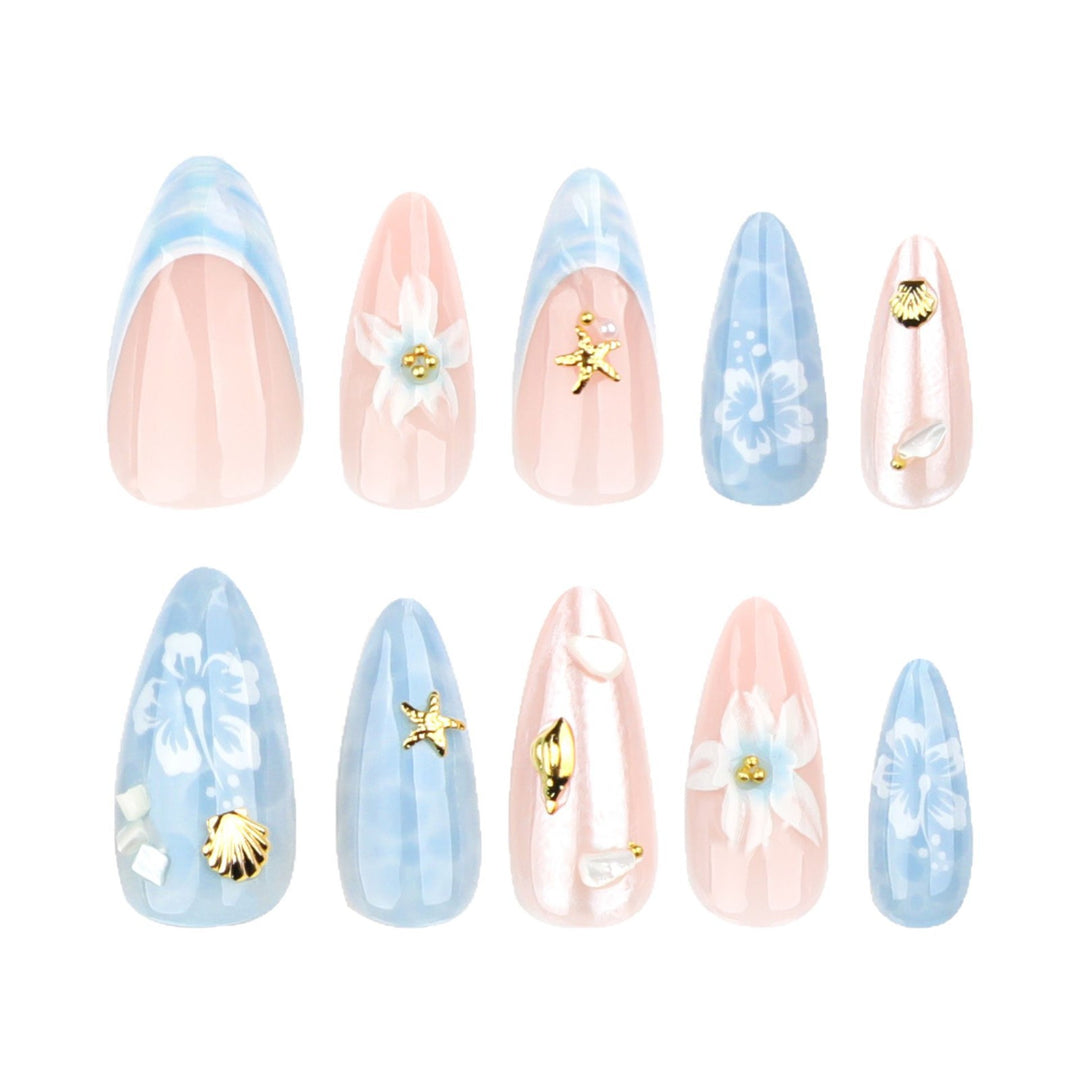 Artful nail extensions with delicate floral designs and glitter accents Bowlift