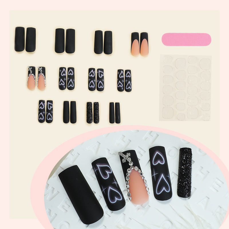 Artificial nail set with elegant glitter and heart designs Bowlift