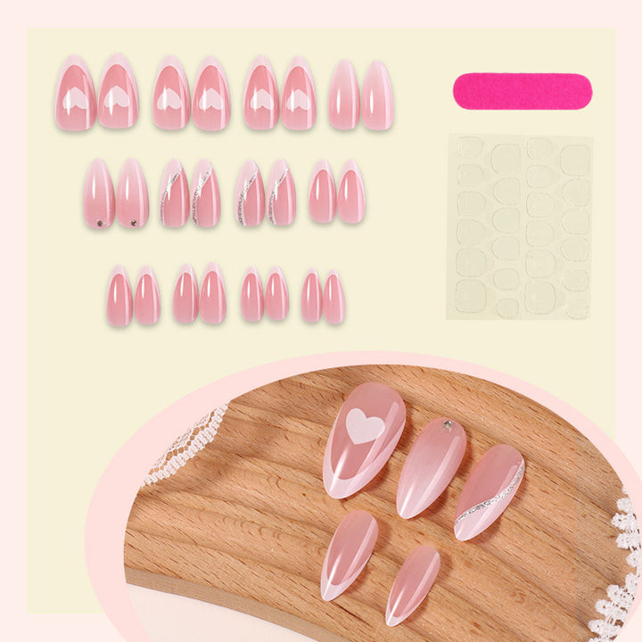 Acrylic nail set with romantic heart and glitter accents Bowlift