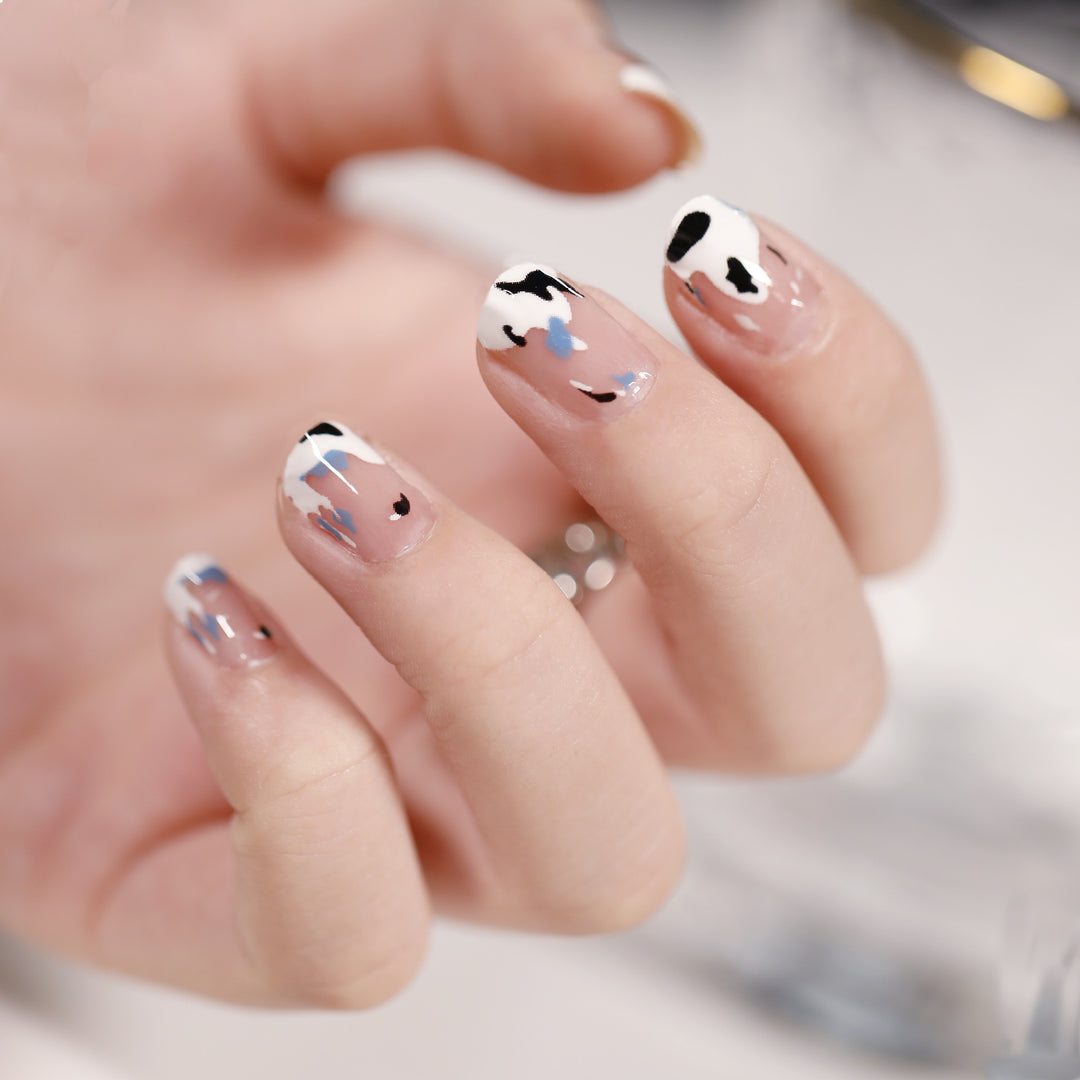 Artificial nail art with heart-shaped designs and soft color gradients Bowlift