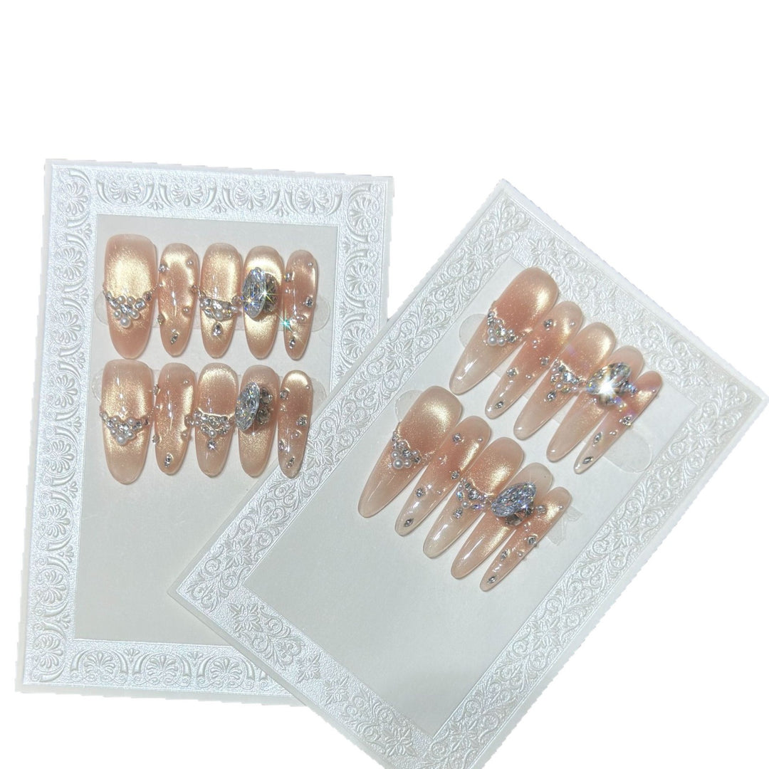 Elegant Stiletto Nail Art Set with Rhinestone and Glitter Detailing Bowlift