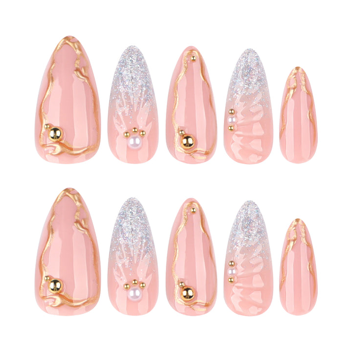 Artful stiletto nails with elegant gold embellishment design Bowlift