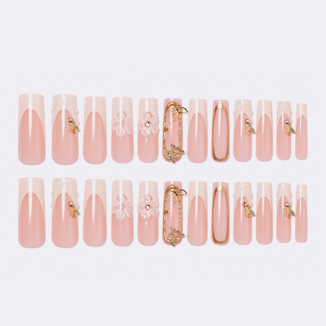 Artificial nail set with floral engravings and elegant embellishments Bowlift