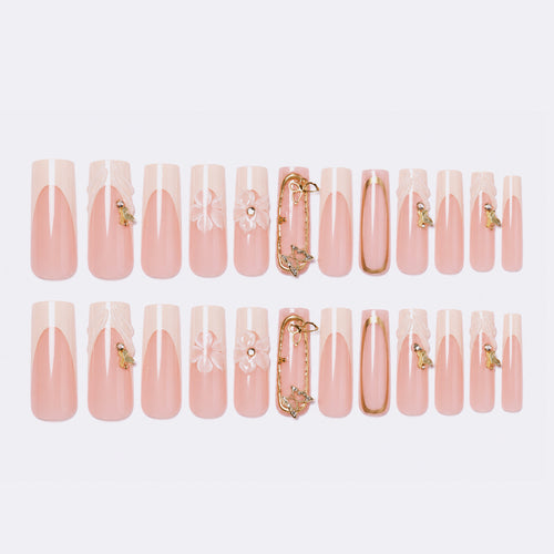 Artificial nail set with floral engravings and elegant embellishments Bowlift