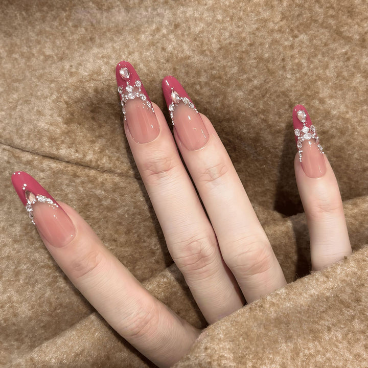 Artificial nails with sparkling rhinestone accents Bowlift