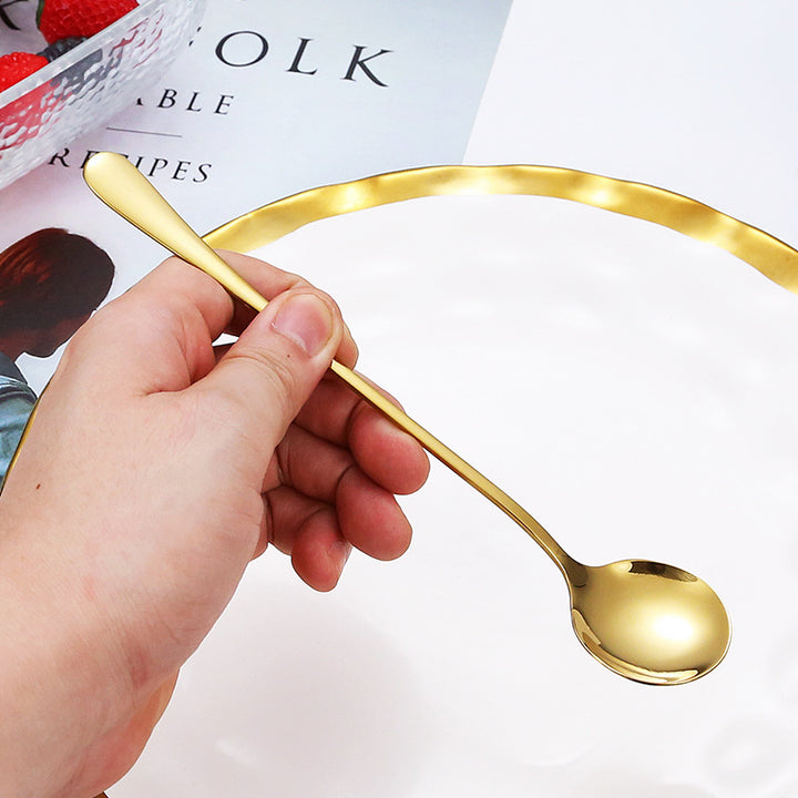 Elegant teaspoon with polished gold surface Bowlift