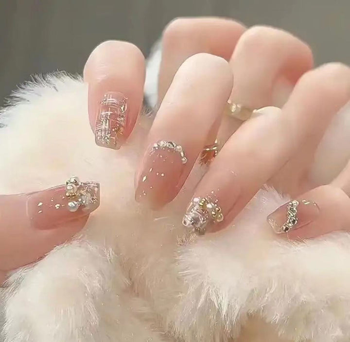 Elegant Nail Art with Glitter and Rhinestones Bowlift